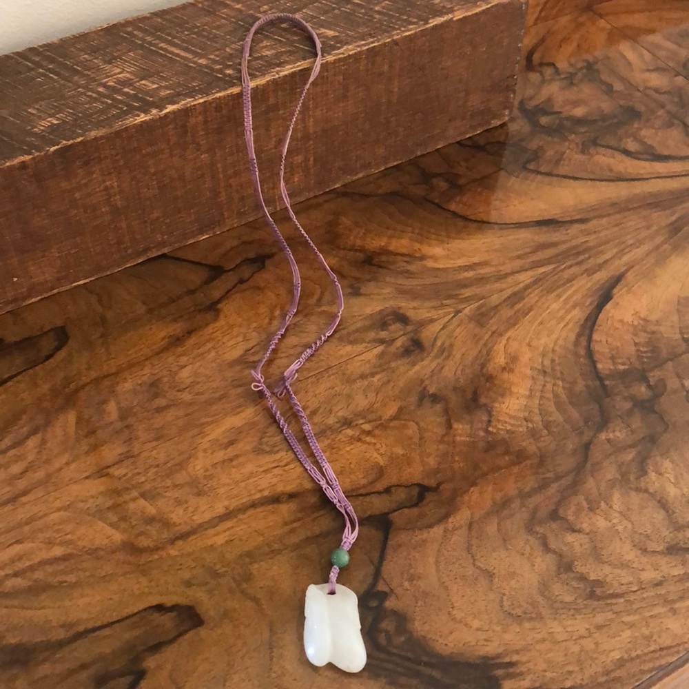 Natural jade pendant necklace.